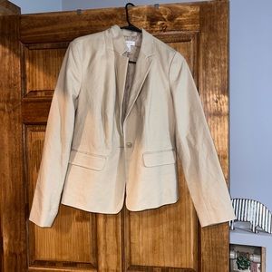 A tan blazer that has only been worn once!